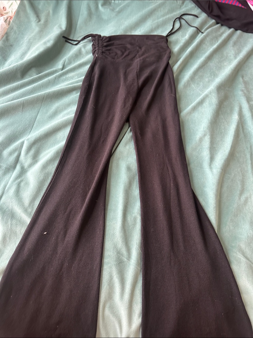 High-Waist Black Ribbed Flare Pants with Adjustable Side Ties